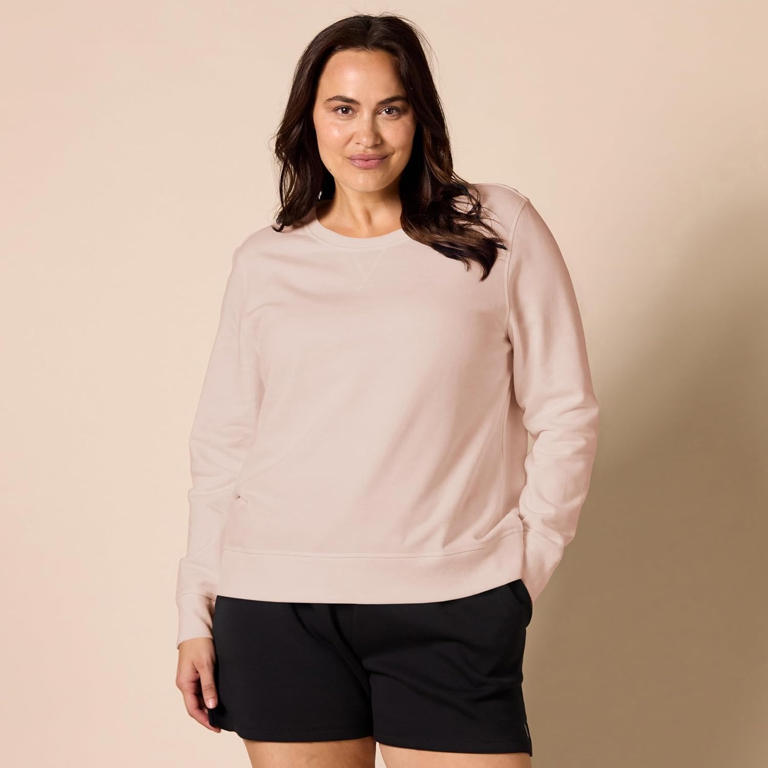 image:imageAmazon Essentials Womens Fleece Crewneck Long Sleeve Pullover Sweatshirt Available in Plus SizeLight Pink