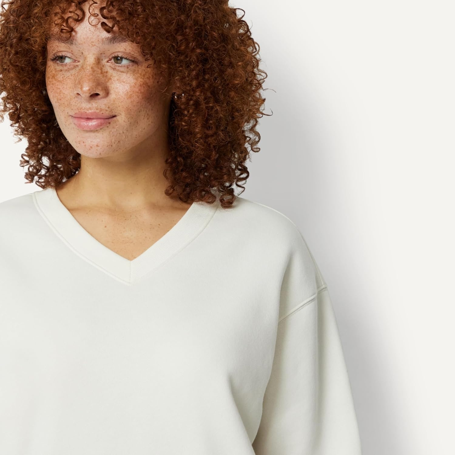image:imageAmazon Essentials Womens Oversized VNeck Fleece Pullover SweatshirtCream
