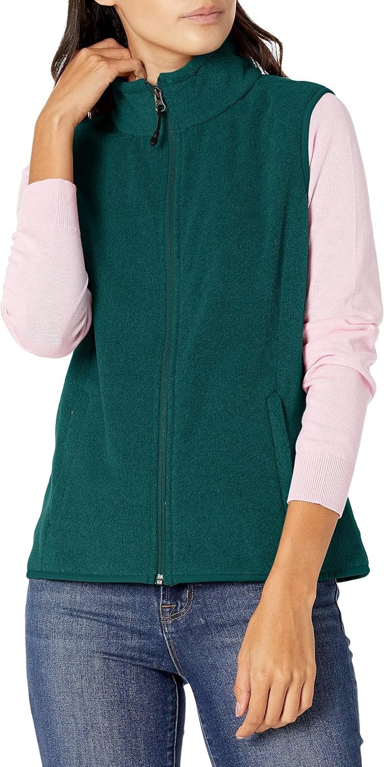 image:imageAmazon Essentials Womens ClassicFit Sleeveless Polar Soft Fleece Vest with Zip Pockets Available in Plus SizeDeep Pine