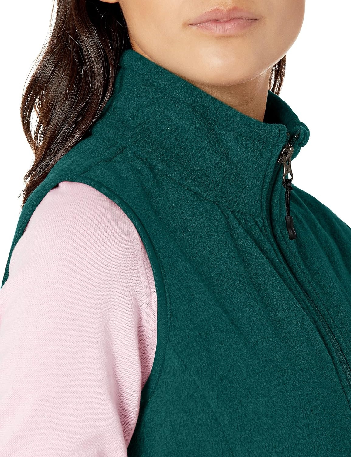 image:imageAmazon Essentials Womens ClassicFit Sleeveless Polar Soft Fleece Vest with Zip Pockets Available in Plus SizeDeep Pine