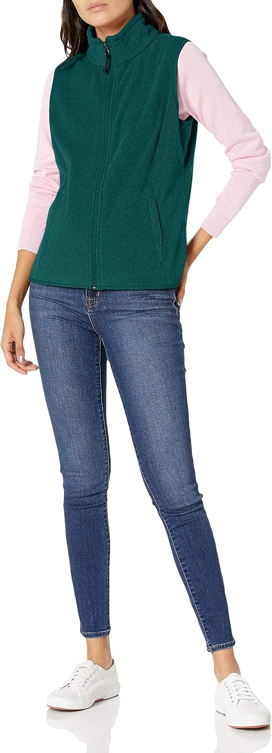 image:imageAmazon Essentials Womens ClassicFit Sleeveless Polar Soft Fleece Vest with Zip Pockets Available in Plus SizeDeep Pine