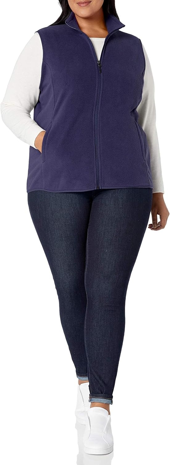 image:imageAmazon Essentials Womens ClassicFit Sleeveless Polar Soft Fleece Vest with Zip Pockets Available in Plus SizeNavy