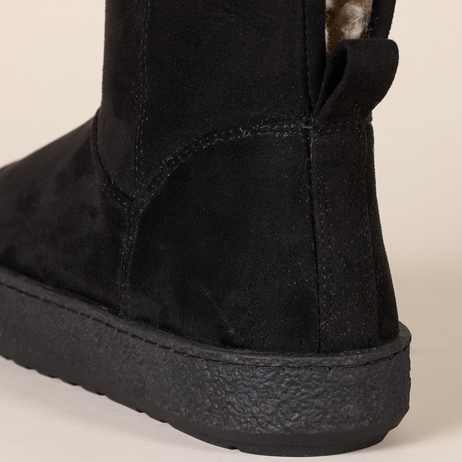 image:imageAmazon Essentials Womens Faux Fur Lined Shearling Boots PullOn DesignBlack Microsuede