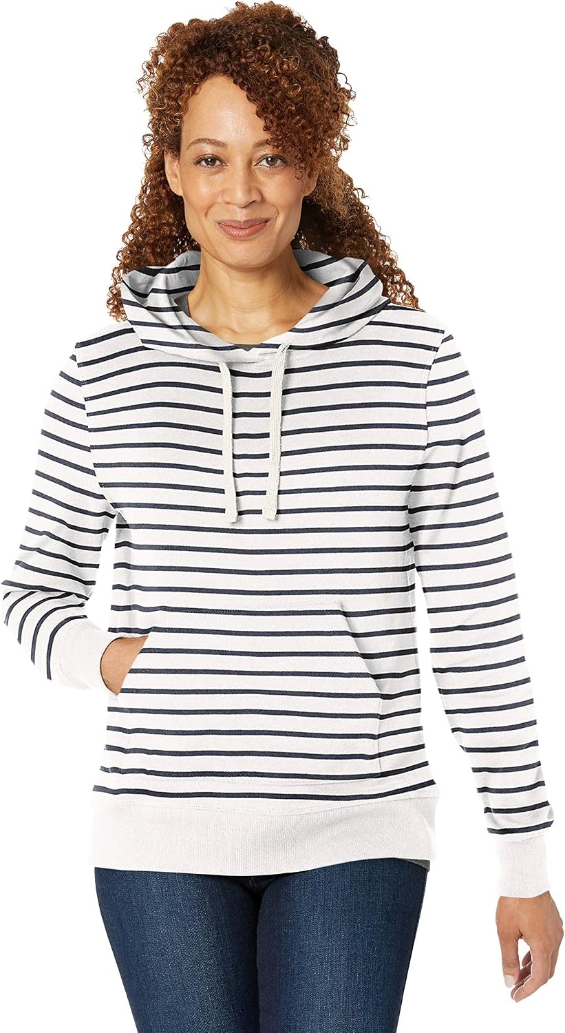 image:imageAmazon Essentials Womens RegularFit Midweight Fleece Pullover Hoodie with Kangaroo Pocket Available in Plus SizeWhite Stripe