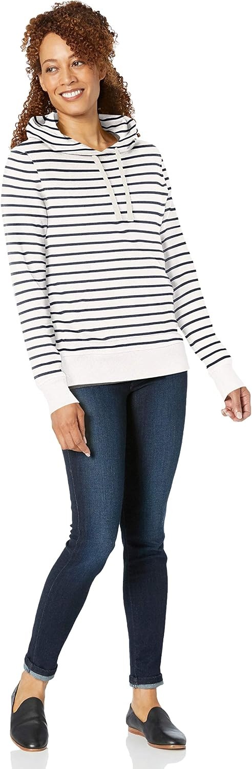 image:imageAmazon Essentials Womens RegularFit Midweight Fleece Pullover Hoodie with Kangaroo Pocket Available in Plus SizeWhite Stripe