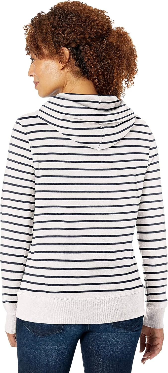 image:imageAmazon Essentials Womens RegularFit Midweight Fleece Pullover Hoodie with Kangaroo Pocket Available in Plus SizeWhite Stripe